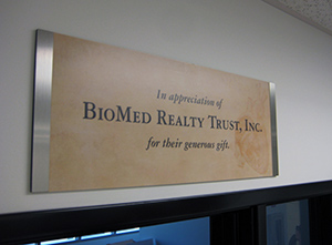 BioMed Reality Trust, Inc. Sign on over door.
